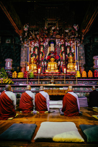 Monks praying at Beomosa Temple in Busan
